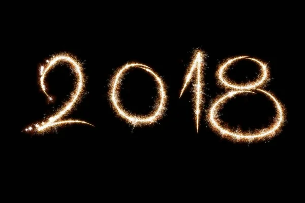 2018 written with Sparkle firework on black background, happy ne