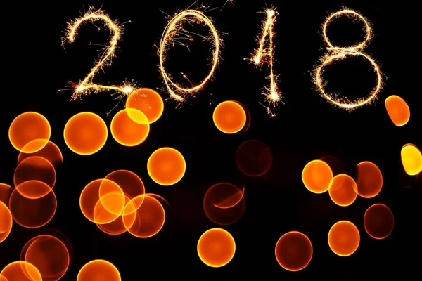 Yeni yıl 2018. Dairesel bokeh arka plan Noel ışık — Stok fotoğraf