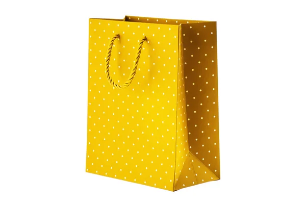 Bolso de papel amarillo sobre fondo blanco — Foto de Stock