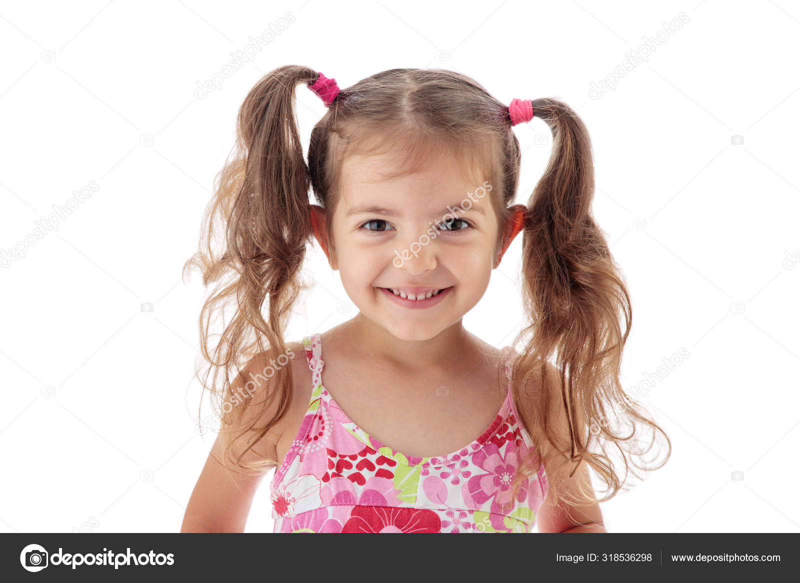 Kids and Sport. Side View of a Happy Little Girl Smiling at Camera