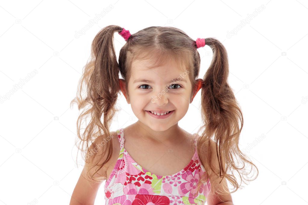 Happy beautiful little girl smiling against camera, portrait