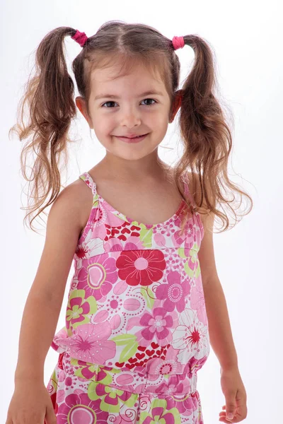 Beautiful little girl portrait. Young lady smiling and posing. — Stockfoto