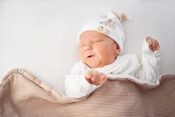 Newborn adorable one week baby boy sleeping