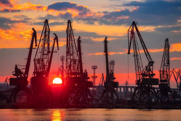 stock image Sea port and industrial cranes, Varna, Bulgaria.Sunset over the Varna lake