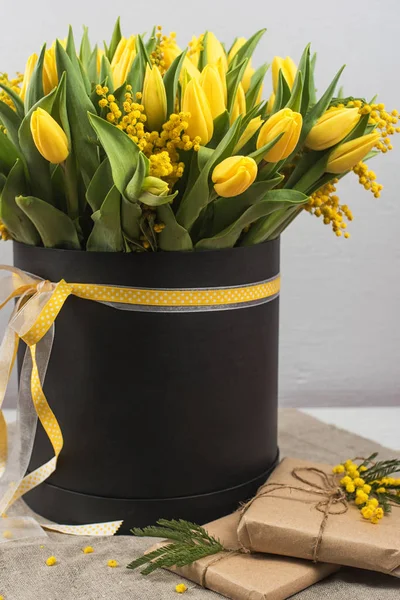 Bright spring bouquet of tulips and mimosa flowers — Stock Photo, Image