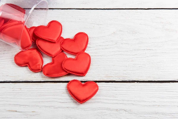 Red hearts on a white wood background — Stock Photo, Image