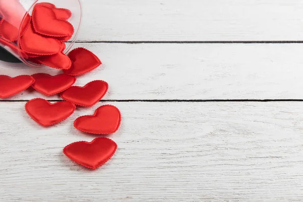 Red hearts on a white wood background — Stock Photo, Image