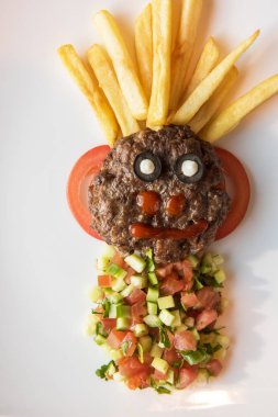 Komik et pirzola yüz