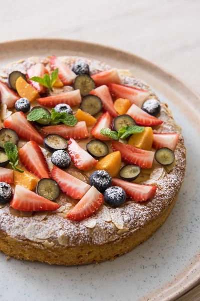 cakes with fruit and berries