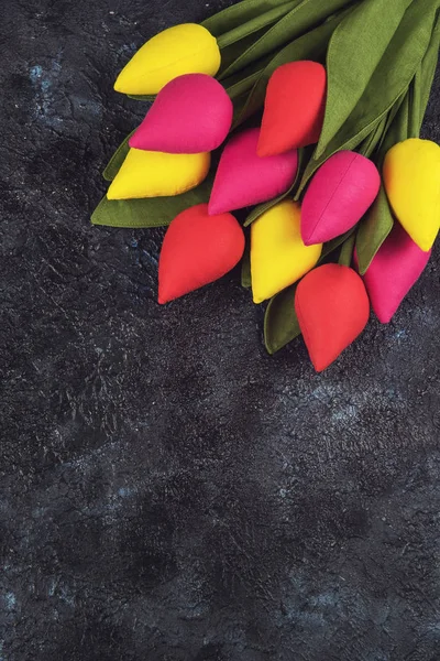 Handmade and real tulips on darken — Stock Photo, Image