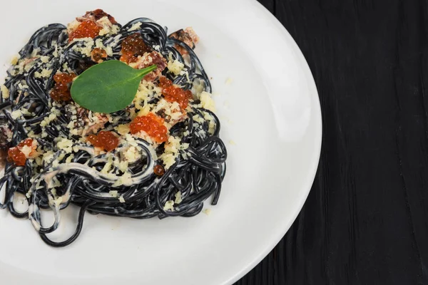 Black pasta with cuttlefish ink — Stock Photo, Image