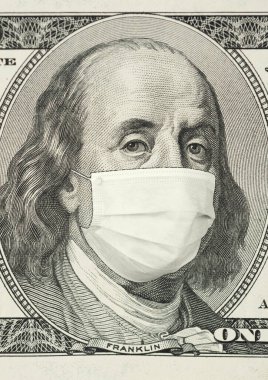 Portrait of Franklin on 100 dollar banknote with medical mask