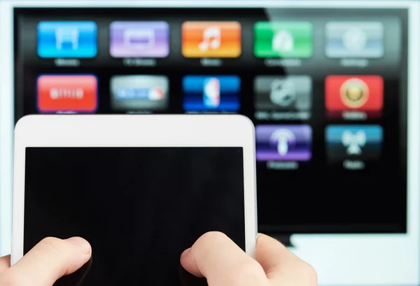 Using tablet for smart tv — Stock Photo, Image