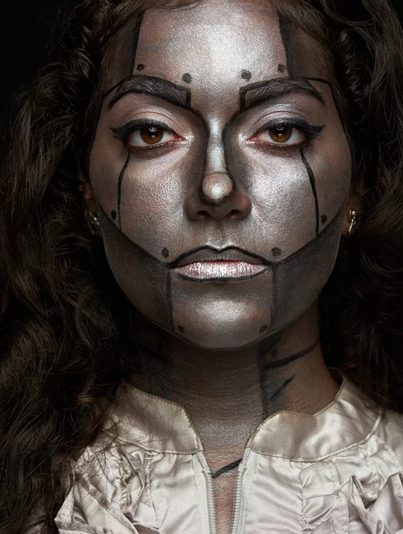 Zilveren metalen vrouwen gezicht — Stockfoto