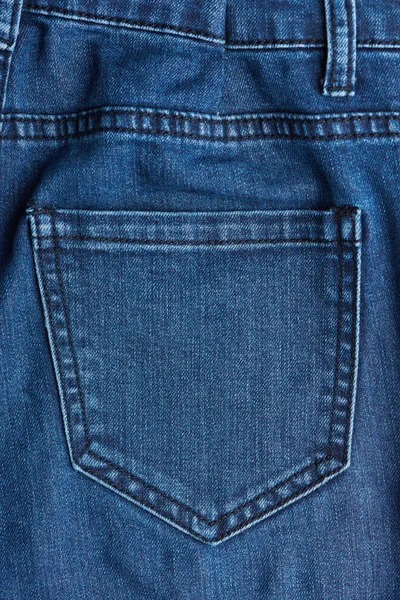 Close up van terug jeans zak — Stockfoto