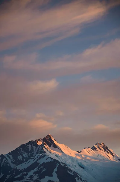 Mountain peak on sunset sky — Stock Photo, Image
