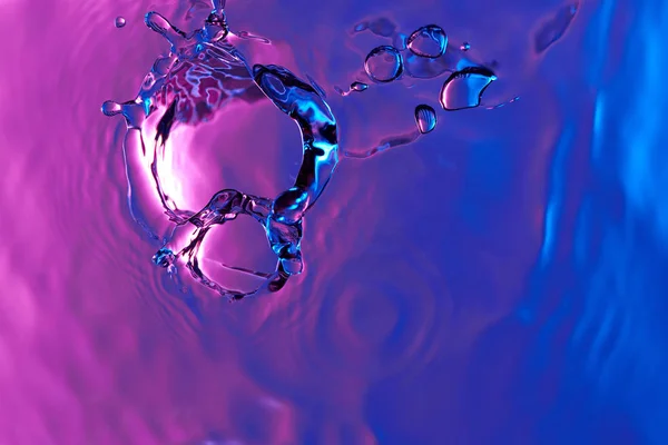 Salpicadura de agua colorida —  Fotos de Stock