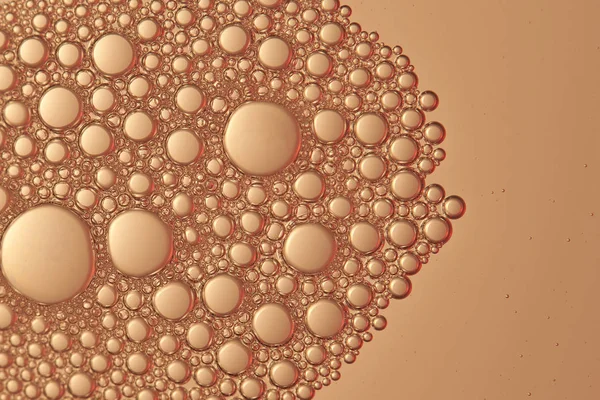 Burbujas líquidas abstractas de color dorado —  Fotos de Stock