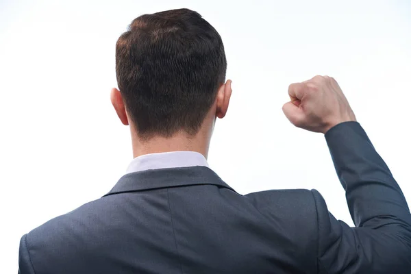 Hombre de negocios con el puño en alto — Foto de Stock