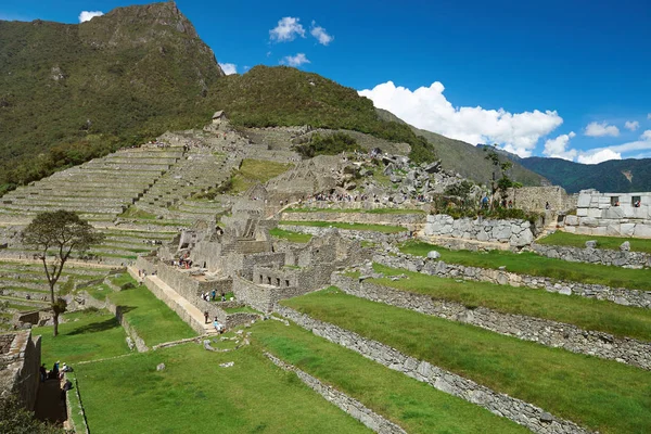 Tourist people walking in Machu Picchu