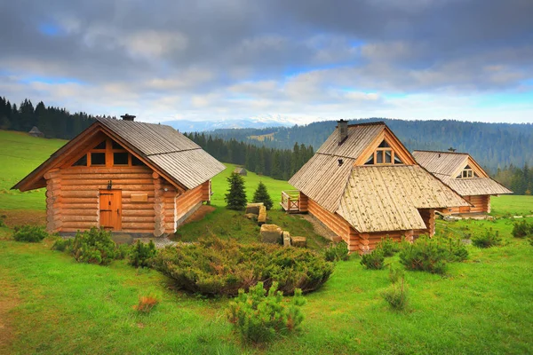 Ecological wooden houses on mounain hills