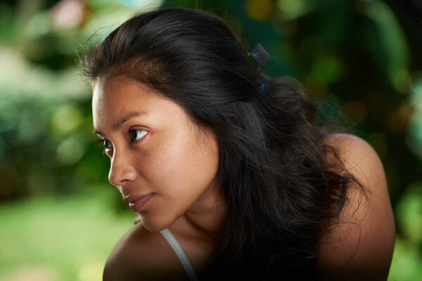 Hispanic  girl look on side