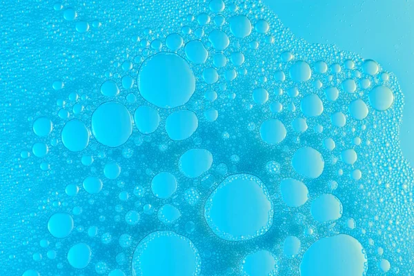 Washing liquid bubbles close up