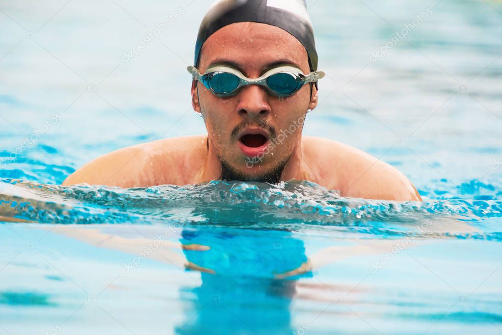 Wet swimming man 