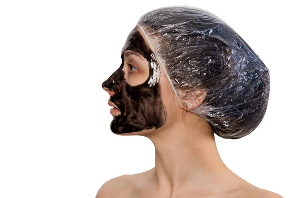 Retrato de perfil de mulher com máscara de descascamento preta — Fotografia de Stock