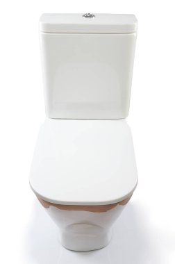 Kapalı beyaz tuvalet.