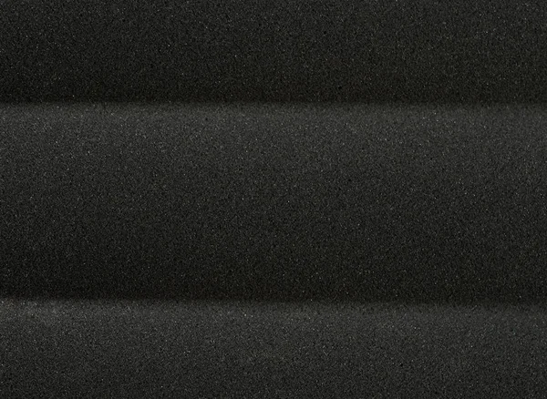 Dark gray foam background