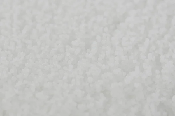 Povrch bílých granulí — Stock fotografie