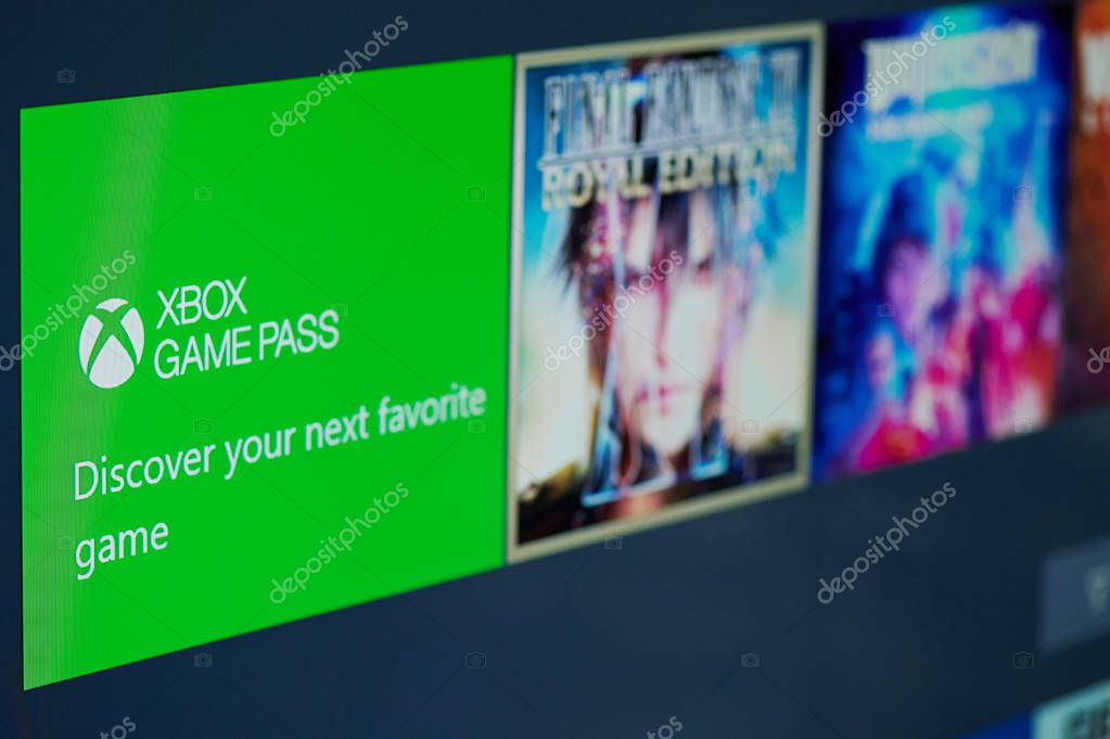 New-York , USA - February  11, 2020: Xbox game pass subscription  for gaming online on tv screen close up