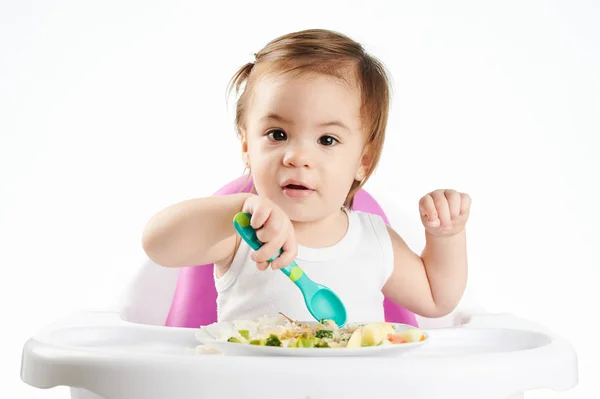 Funny caucasian baby girl with spoon — Stock Photo, Image