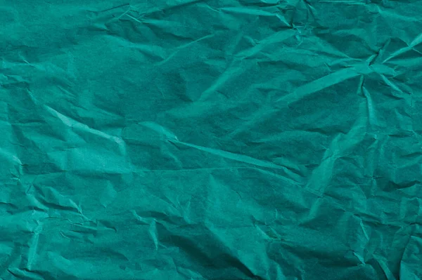 Yeşil Buruşmuş Ambalaj Kağıdı Arkaplanı Yakın Plan Görüntüsü — Stok fotoğraf