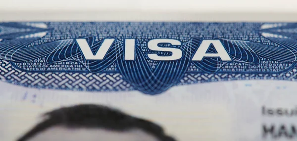Macro of Usa visa stamp in passport. Travel to america theme