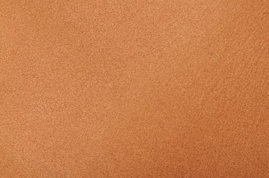 Yumuşak kahverengi deri arka plan makrosu yakın görünüm