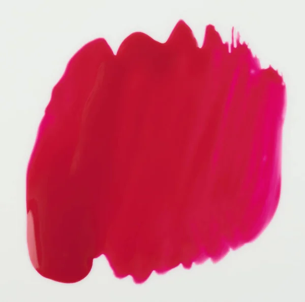 Glänzend Rote Farbflecke Isoliert Auf Weißem Hintergrund Nahaufnahme — Stockfoto