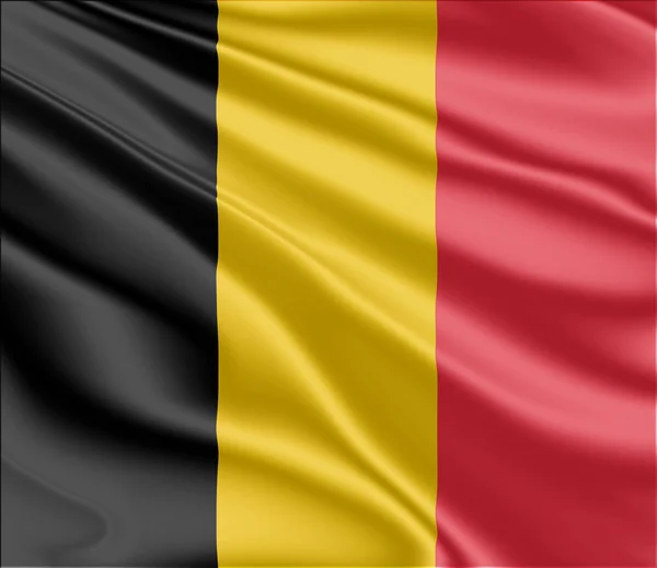 Belgiens flagga fladdrar i vinden — Stockfoto