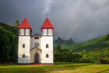 Rainbow on Haapiti church in Moorea island, landscape clipart