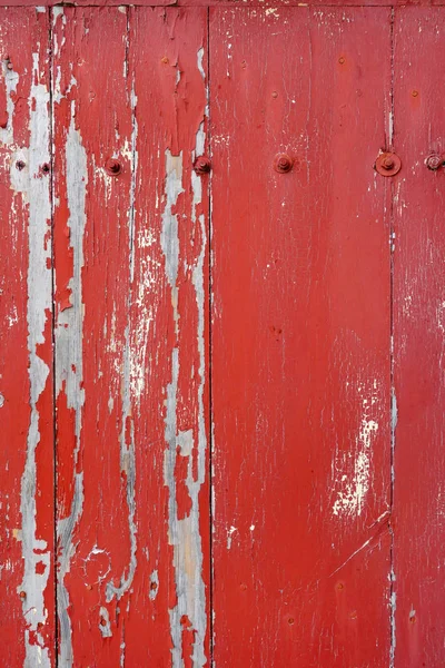 Placa de madeira velha pintada de vermelho — Fotografia de Stock