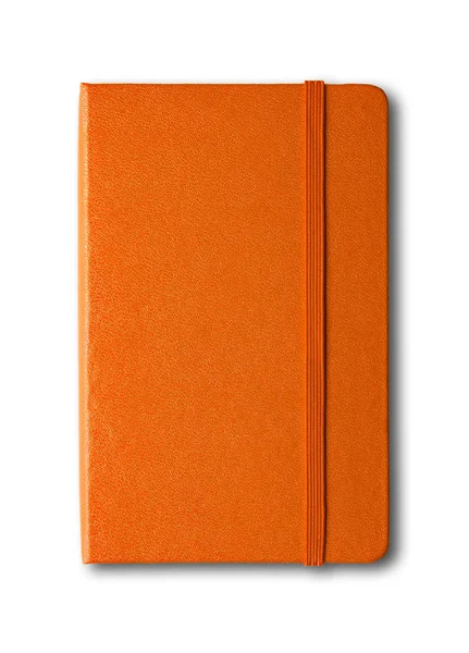 Orange closed notebook isolated on white — Stock Photo, Image