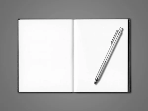 Boş açık defter ve koyu gri izole kalem — Stok fotoğraf