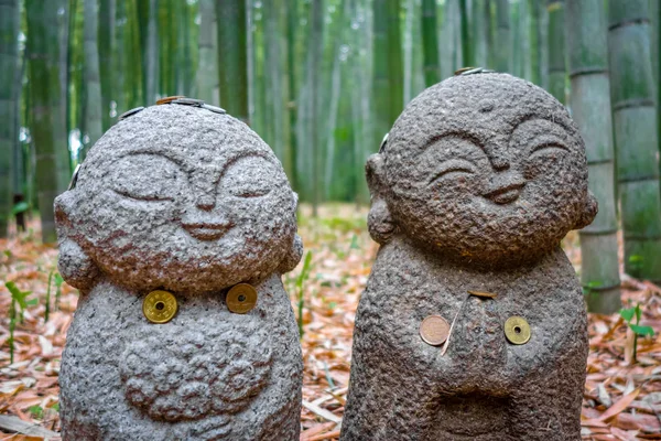 Jizo Statues in Arashiyama bamboo forest, Kyoto, Japan Stock Photo