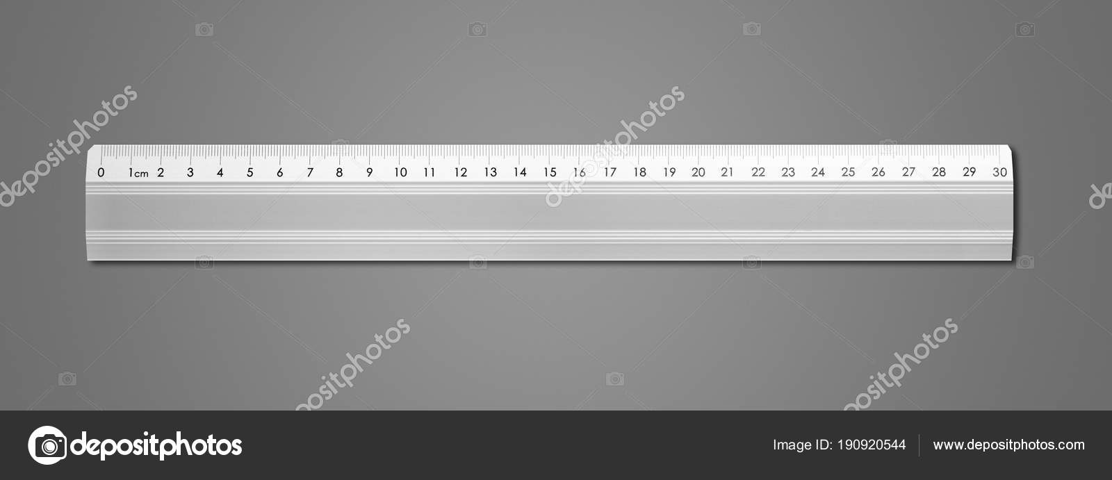 Metal ruler isolated on dark grey background Stock Photo by ©daboost ...