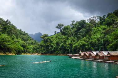 Floating village in Cheow Lan Lake, Khao Sok, Thailand clipart