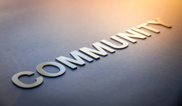 Word community written with white solid letters — Stock Photo, Image