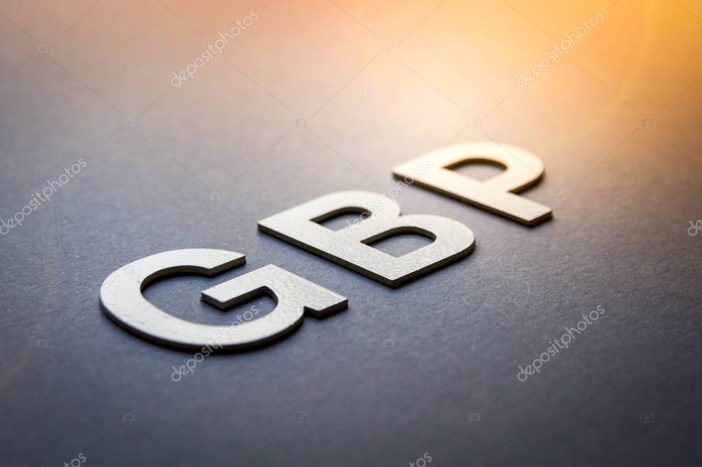 Word GBP written with white solid letters on a board