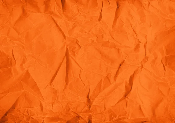 オレンジ色の紙を丸めてテクスチャ背景 — ストック写真