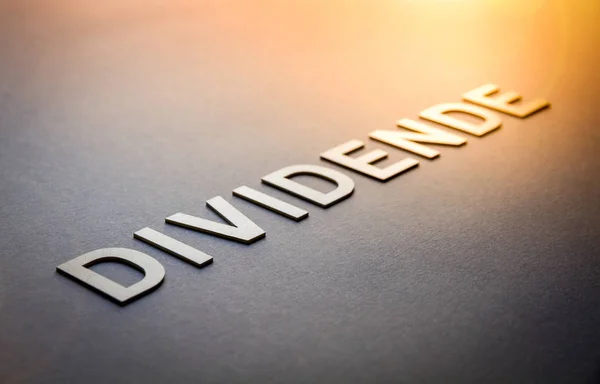 Word dividende written with white solid letters — Stock Photo, Image